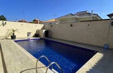 Imagem: A casa em condomínio possui 2 Dormitórios, 4 Banheiros, 5