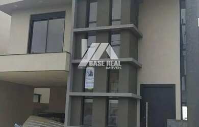 Imagem: A casa em condomínio possui 4 Dormitórios, 4 Banheiros, 262m²