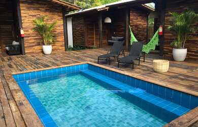 Imagem: A casa possui 5 Dormitórios, 5 Banheiros, 5 Vagas na garagem