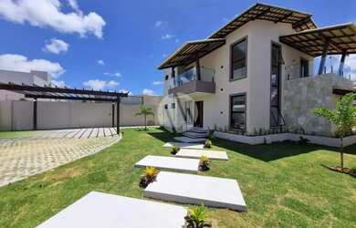 Imagem: A casa possui 3 Dormitórios, 4 Banheiros, 4 Vagas na garagem