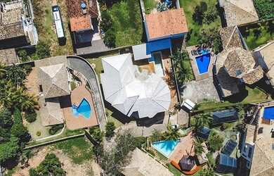 Imagem: A casa em condomínio possui 4 Dormitórios, 5 Banheiros, 4