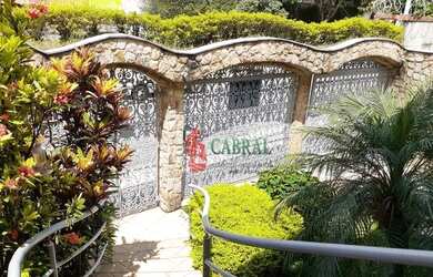 Imagem: A casa e possui 3 Dormitórios, Suítes, 5 Banheiros, 5 Vagas