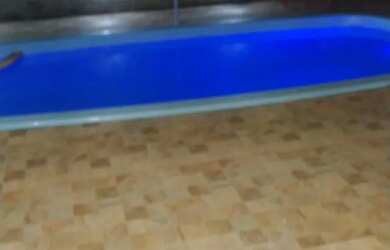 Imagem: A casa possui 3 Dormitórios, 5 Vagas na garagem e está localizado