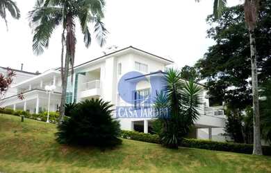 Imagem: A casa em condomínio possui 4 Dormitórios, 4 Banheiros, 5