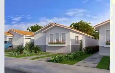 Imagem: A casa possui 3 Dormitórios, 2 Banheiros, 2 Vagas na garagem