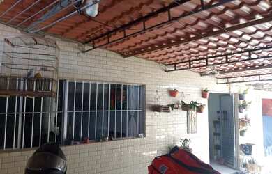 Imagem: A casa possui 3 Dormitórios, 3 Banheiros, 1 Vaga na garagem