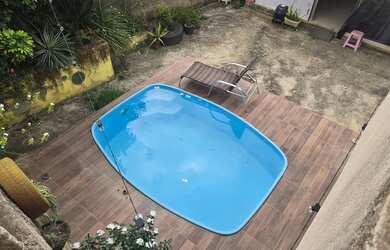 Imagem: A casa possui 4 Dormitórios, 3 Banheiros, 1 Vaga na garagem