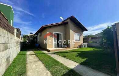 Imagem: A casa possui 3 Dormitórios, 2 Banheiros, 3 Vagas na garagem