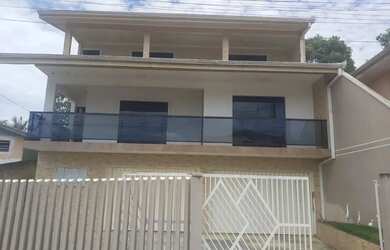 Imagem: A casa possui 5 Dormitórios, 3 Banheiros, 5 Vagas na garagem