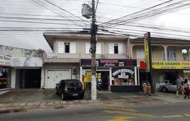 Imagem: A casa possui 3 Dormitórios, 3 Banheiros, 5 Vagas na garagem