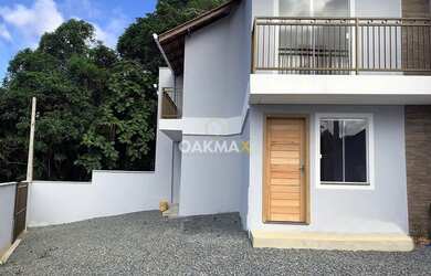 Imagem: A casa possui 2 Dormitórios, 1 Banheiro, 2 Vagas na garagem