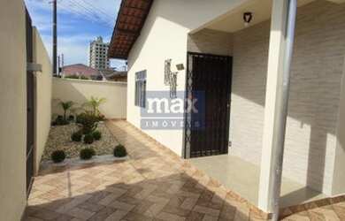 Imagem: A casa possui 3 Dormitórios, 3 Banheiros, 2 Vagas na garagem