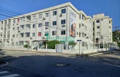 Imagem: O apartamento possui 3 Dormitórios, 1 Banheiro, 1 Vaga na garagem