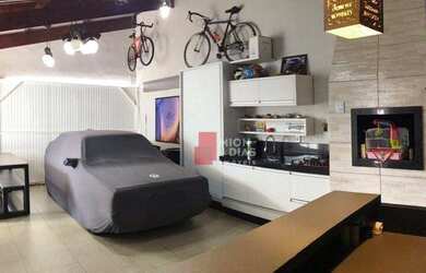 Imagem: A casa possui 3 Dormitórios, 2 Banheiros, 3 Vagas na garagem