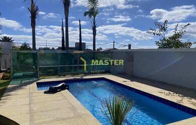 Imagem: A casa possui 4 Dormitórios, 4 Banheiros, 4 Vagas na garagem