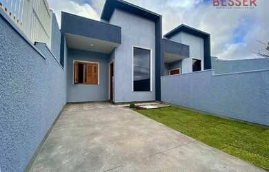 Imagem: A casa possui 2 Dormitórios, 1 Banheiro, 2 Vagas na garagem