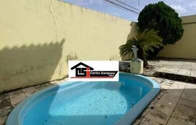 Imagem: A casa possui 4 Dormitórios, 4 Banheiros, 5 Vagas na garagem