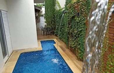 Imagem: A casa possui 3 Dormitórios, 3 Banheiros, 3 Vagas na garagem