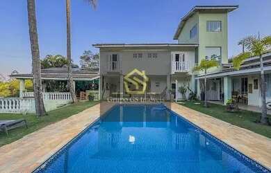 Imagem: A casa em condomínio possui 5 Dormitórios, 5 Banheiros, 5