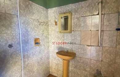 Imagem: A casa possui 3 Dormitórios, 2 Banheiros, 3 Vagas na garagem