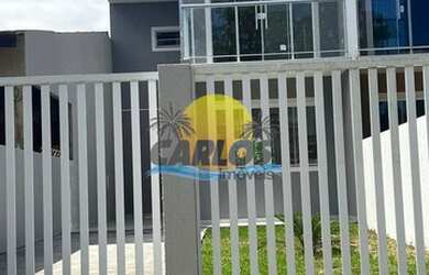 Imagem: A casa possui 3 Dormitórios, 2 Banheiros, 3 Vagas na garagem