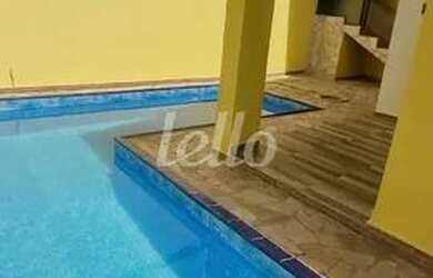 Imagem: A casa possui 3 Dormitórios, 3 Banheiros, 4 Vagas na garagem