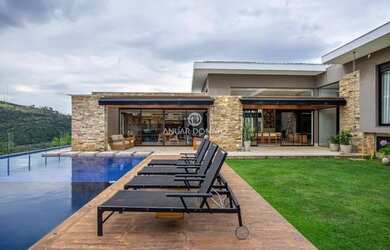 Imagem: A casa em condomínio possui 5 Dormitórios, 5 Banheiros, 5