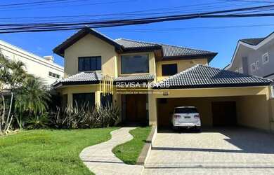 Imagem: A casa em condomínio possui 4 Dormitórios, 5 Banheiros, 4