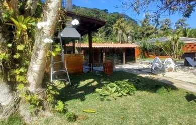 Imagem: A casa em condomínio possui 5 Dormitórios, 5 Banheiros, 2