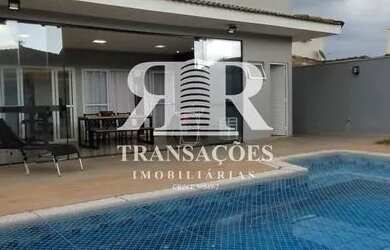 Imagem: A casa possui 3 Dormitórios, 5 Banheiros, 2 Vagas na garagem