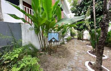 Imagem: A casa possui 4 Dormitórios, 4 Banheiros, 3 Vagas na garagem