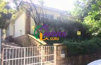 Imagem: A casa possui 5 Dormitórios, 4 Banheiros, 5 Vagas na garagem