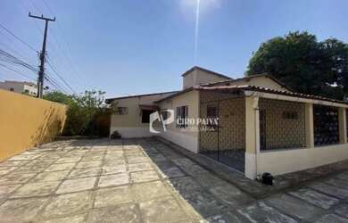 Imagem: A casa possui 3 Dormitórios, 3 Banheiros, 3 Vagas na garagem