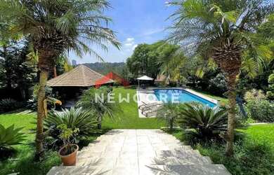 Imagem: A casa em condomínio possui 4 Dormitórios, 5 Banheiros, 5