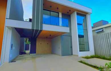 Imagem: A casa possui 3 Dormitórios, 5 Banheiros, 3 Vagas na garagem