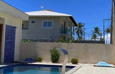 Imagem: A casa em condomínio possui 5 Dormitórios, 5 Banheiros, 5