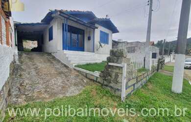 Imagem: A casa possui 2 Dormitórios, 1 Banheiro, 1 Vaga na garagem