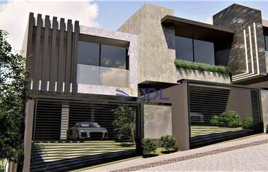 Imagem: A casa possui 3 Dormitórios, 5 Banheiros, 2 Vagas na garagem