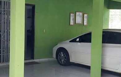 Imagem: A casa possui 3 Dormitórios, 3 Banheiros, 3 Vagas na garagem