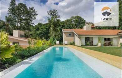 Imagem: A casa em condomínio possui 4 Dormitórios, 3 Banheiros, 4