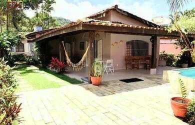 Imagem: A casa possui 4 Dormitórios, 2 Banheiros, 4 Vagas na garagem