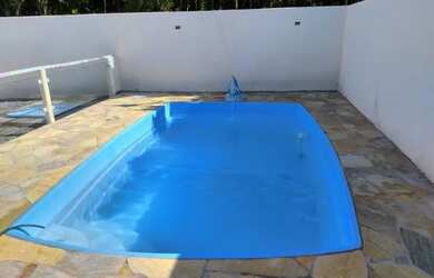 Imagem: A casa possui 5 Dormitórios, 4 Vagas na garagem e está localizado