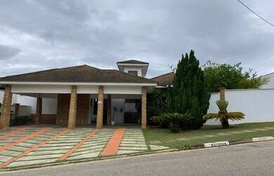 Imagem: A casa em condomínio possui 4 Dormitórios, 5 Banheiros, 5