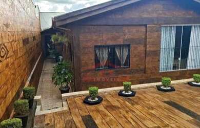 Imagem: A casa possui 5 Dormitórios, 3 Banheiros, 2 Vagas na garagem