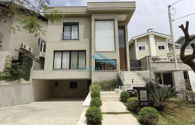 Imagem: A casa em condomínio possui 4 Dormitórios, 5 Banheiros, 4