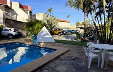 Imagem: A casa possui 3 Dormitórios, 4 Banheiros, 2 Vagas na garagem