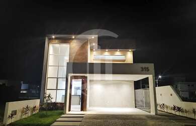 Imagem: A casa em condomínio possui 3 Dormitórios, 3 Banheiros, 2