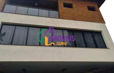 Imagem: A casa possui 4 Dormitórios, 4 Banheiros, 5 Vagas na garagem