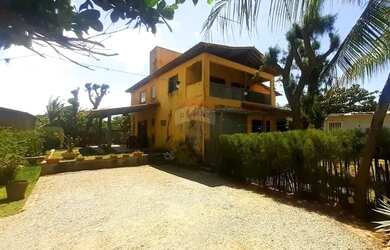 Imagem: A casa possui 5 Dormitórios, 5 Banheiros, 5 Vagas na garagem