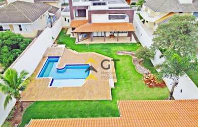 Imagem: A casa possui 5 Dormitórios, 5 Banheiros, 5 Vagas na garagem